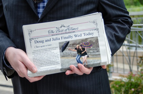 usher holding wedding programs